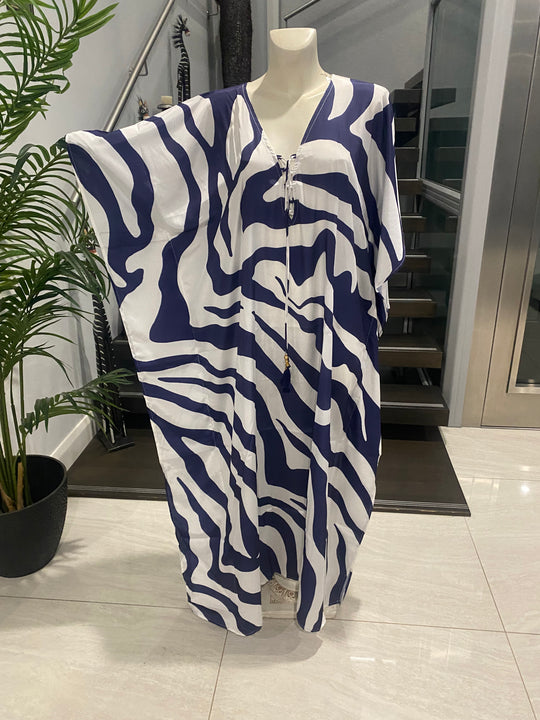 Coco Bella Milano’s White kaftan 12-20