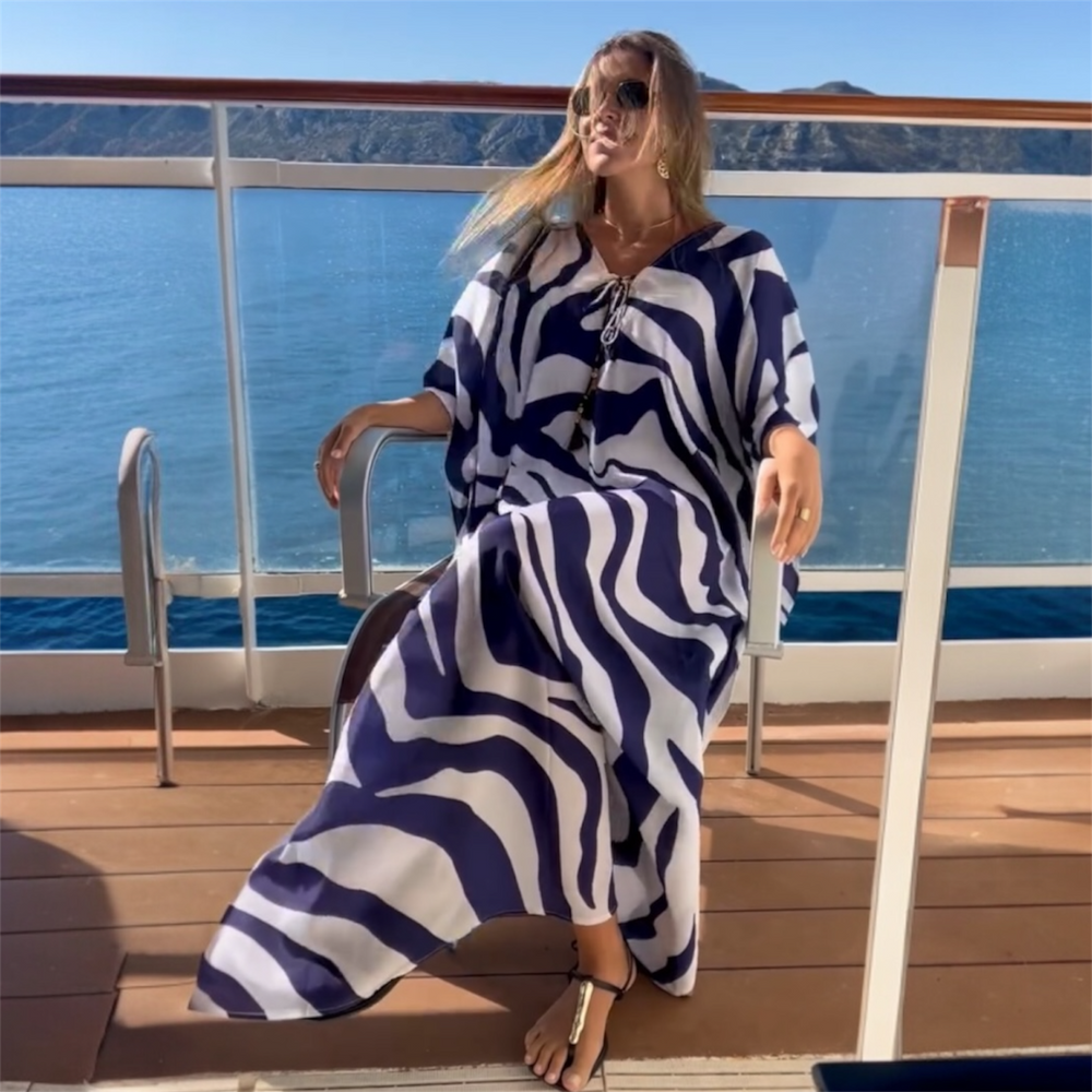 Coco Bella Milano’s White kaftan 12-20